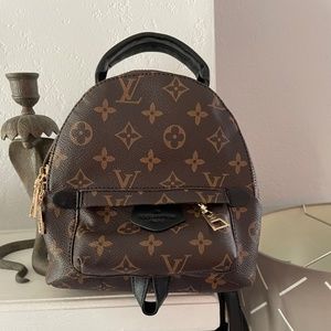 Louis Vuitton print mini back pack